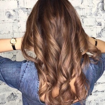 fair skin warm undertone caramel brunette hair color redken
