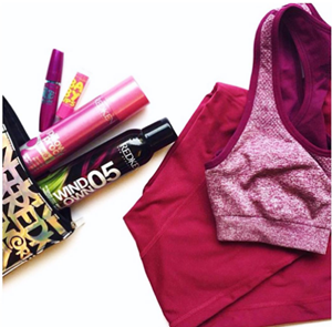 Gym clothes and quality beauty products are a must when packing any gym bag.