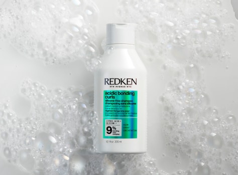 Redken2024AcidicBondingCurlsTEXTUREShampooBottleShot20106COMPRGB