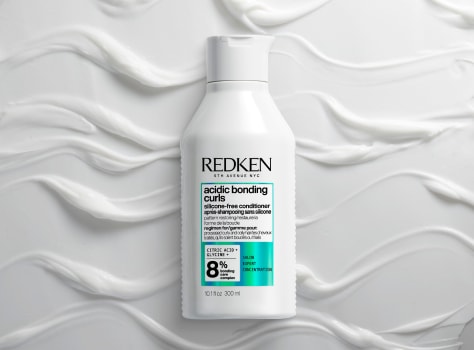 Redken2024NAAcidicBondingCurlsTEXTUREConditionerBottleShot40194COMPRGB