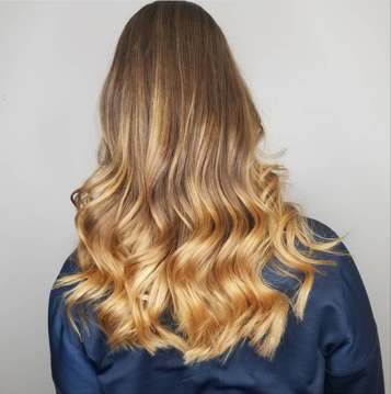 Long golden wavy blonde hair. 